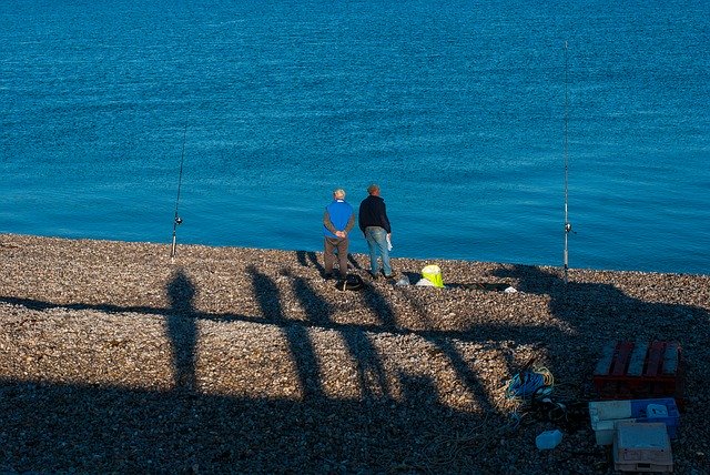 Free download Beach Sea Fisherman -  free photo or picture to be edited with GIMP online image editor