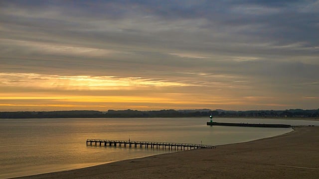 Free download beach sunset dusk water lighthouse free picture to be edited with GIMP free online image editor