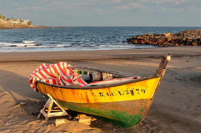 Free download boat beach sea quiet coast ocean free picture to be edited with GIMP free online image editor