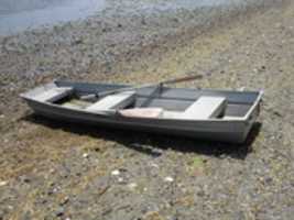 Free download Boat on the Ground at Calf Pasture Beach free photo or picture to be edited with GIMP online image editor