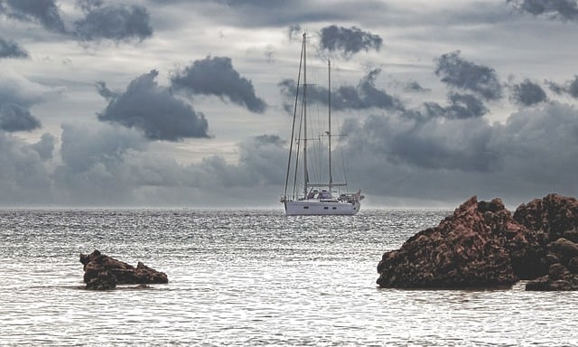 Free download boat sea rock horizon sky clouds free picture to be edited with GIMP free online image editor