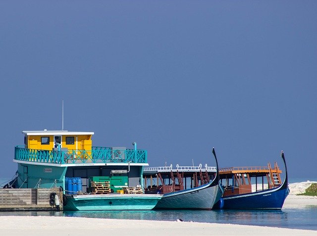 Free download Boat Sea Sand -  free photo or picture to be edited with GIMP online image editor