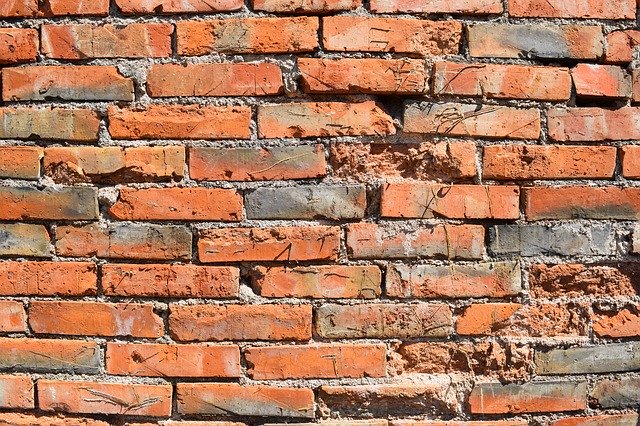 Téléchargement gratuit Brick Wall Orange - photo ou image gratuite à éditer avec l'éditeur d'images en ligne GIMP