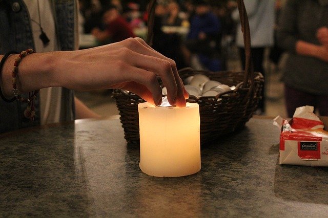 Free download Candle Lighting Hand -  free photo or picture to be edited with GIMP online image editor