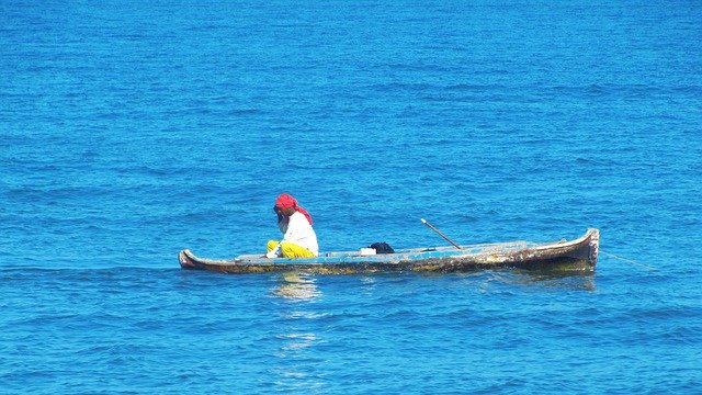 Free download Canoe Cartagena Fisherman -  free photo or picture to be edited with GIMP online image editor