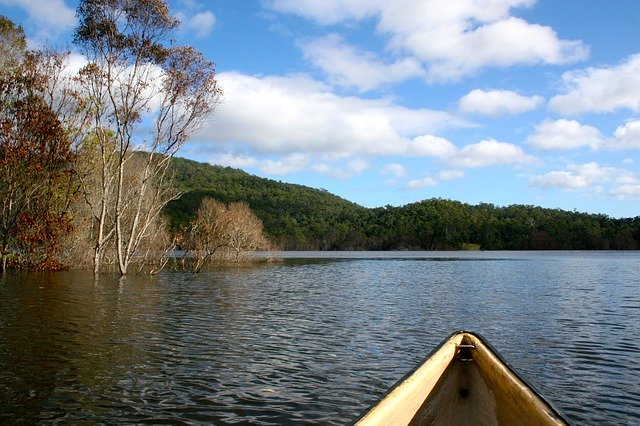 Download gratuito Canoe Tranquil Boat - foto o immagine gratuita da modificare con l'editor di immagini online di GIMP