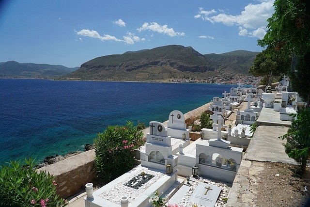 Free download Cemetery Sea Mountains The Tomb -  free photo or picture to be edited with GIMP online image editor