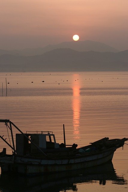 Free download coast sun dusk sea ocean boat free picture to be edited with GIMP free online image editor