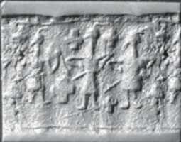 Free download Cylinder seal and modern impression: figures with plumed headdresses and weapons free photo or picture to be edited with GIMP online image editor