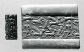 Free download Cylinder seal and modern impression: nude male, griffins, monkey, lion, goat free photo or picture to be edited with GIMP online image editor