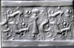 Free download Cylinder seal: female figure, ibex, lion free photo or picture to be edited with GIMP online image editor