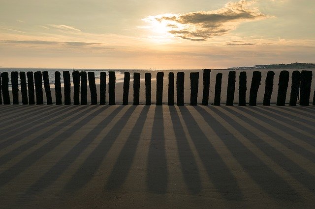 Free download Groynes Sunrise Sea -  free photo or picture to be edited with GIMP online image editor