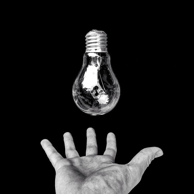 Free download Hand Light Bulb Idea -  free photo or picture to be edited with GIMP online image editor