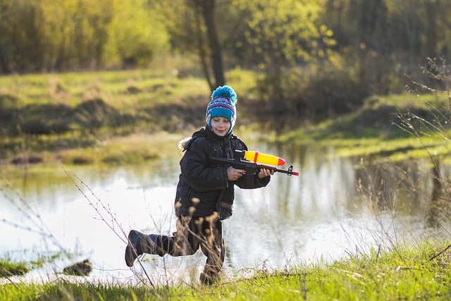 Free download kid play watergun fun lake joy free picture to be edited with GIMP free online image editor