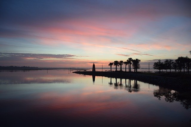 Free download Lighthouse Sunrise Trees Palm -  free photo or picture to be edited with GIMP online image editor