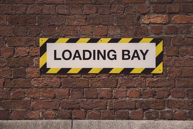 Free download Loading Bay Sign Street Brick -  free photo or picture to be edited with GIMP online image editor