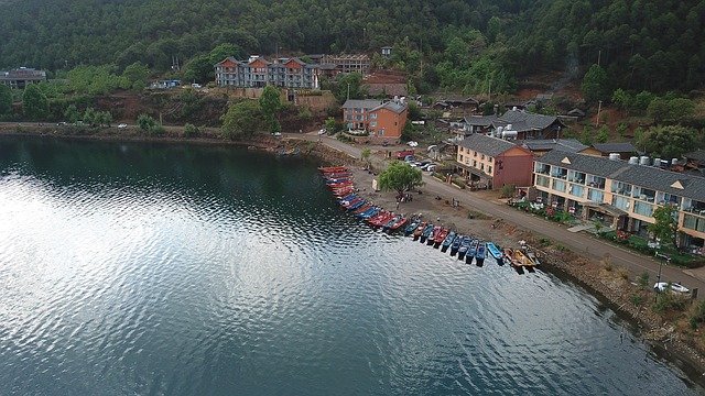 Free download Lugu Lake China Boats -  free photo or picture to be edited with GIMP online image editor