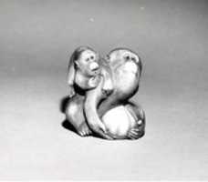 Free download Netsuke of a Female Monkey Holding a Nut while her Baby Crawls on her Back free photo or picture to be edited with GIMP online image editor