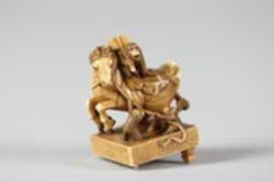 Free download Netsuke of a Horse on a Pedestal with Monkeys Playing About free photo or picture to be edited with GIMP online image editor