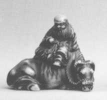 Free download Netsuke of Man Sitting on a Recumbent Ox free photo or picture to be edited with GIMP online image editor