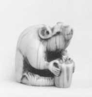 Free download Netsuke of Mouse Gnawing on Candle free photo or picture to be edited with GIMP online image editor