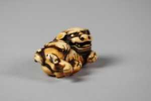 Free download Netsuke of Reclining Dog free photo or picture to be edited with GIMP online image editor