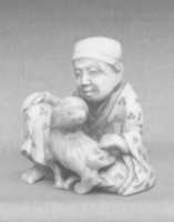 Free download Netsuke of Seated figure of a Man with Dog free photo or picture to be edited with GIMP online image editor