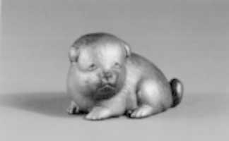 Free download Netsuke of Seated Puppy with Short Curled Tail free photo or picture to be edited with GIMP online image editor