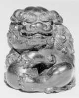 Free download Netsuke of Seated Shishi Clutching a Ball free photo or picture to be edited with GIMP online image editor