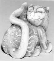 Free download Netsuke of Seated Tiger with a Curled-up Tail Across its Back free photo or picture to be edited with GIMP online image editor