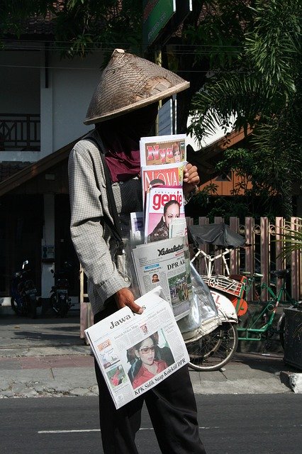 Free download Newspaper Seller Indonesia Road -  free photo or picture to be edited with GIMP online image editor