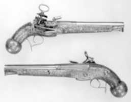 Free download Pair of miquelet flintlock pistols free photo or picture to be edited with GIMP online image editor