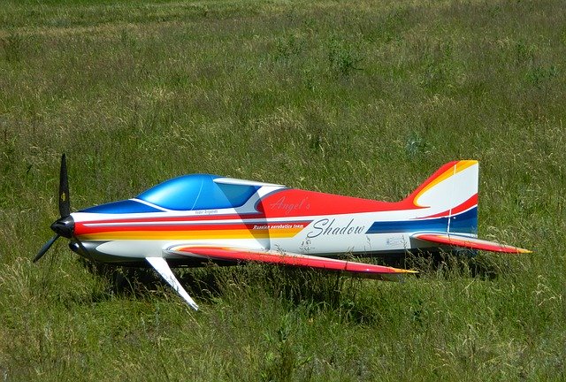 Free download Plane Model Airplane Grass -  free photo or picture to be edited with GIMP online image editor