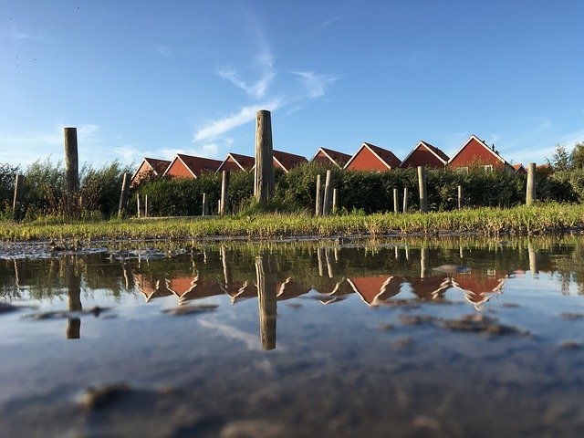 Free download Reflection Fiskenets-Drying Houses -  free free photo or picture to be edited with GIMP online image editor