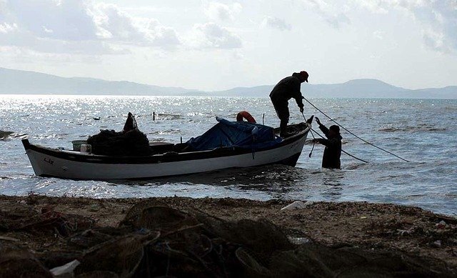 Free download Sea Boat Fisherman -  free photo or picture to be edited with GIMP online image editor