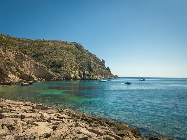 Free download sea boat mountain breakwater javea free picture to be edited with GIMP free online image editor