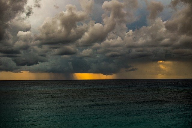 Free download storm sunset clouds sea seascape free picture to be edited with GIMP free online image editor