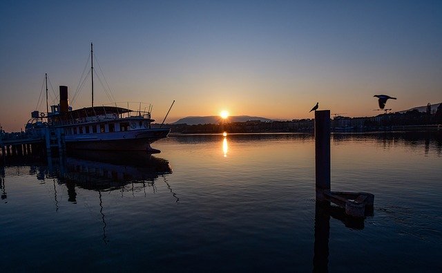 Free download Sunrise Reflection Boat -  free photo or picture to be edited with GIMP online image editor