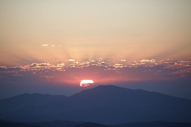 Free download sunrise sun sky clouds mountains free picture to be edited with GIMP free online image editor