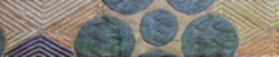 Free download Textile with Partial Pattern of Star Discs on a Background of Concentric Diamond Lozenges free photo or picture to be edited with GIMP online image editor