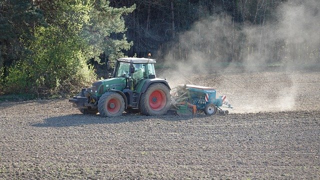 Free download Tractor Seeds Farmer -  free photo or picture to be edited with GIMP online image editor