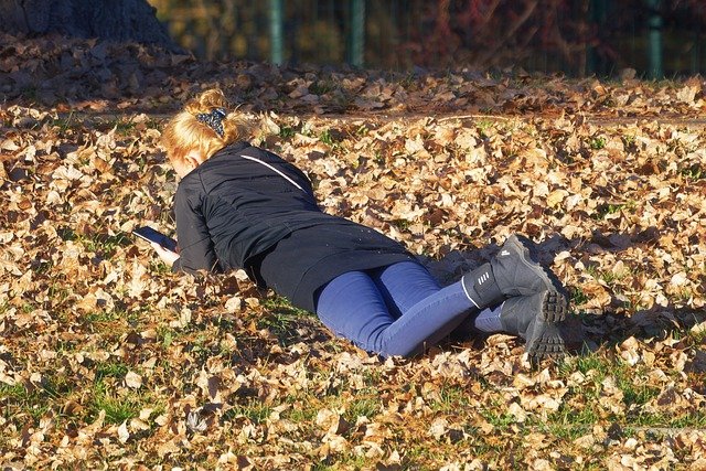 Free download woman lying down dried leaves free picture to be edited with GIMP free online image editor