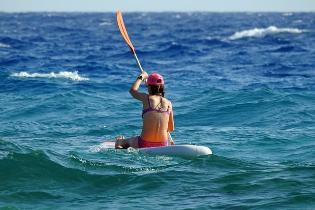 Free download woman sea canoe adventure paddling free picture to be edited with GIMP free online image editor