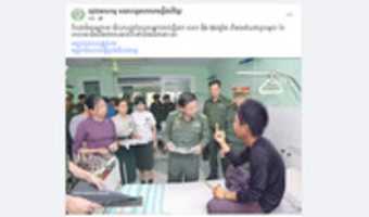 Free download A boy shows obscene hand gesture toward junta leader free photo or picture to be edited with GIMP online image editor