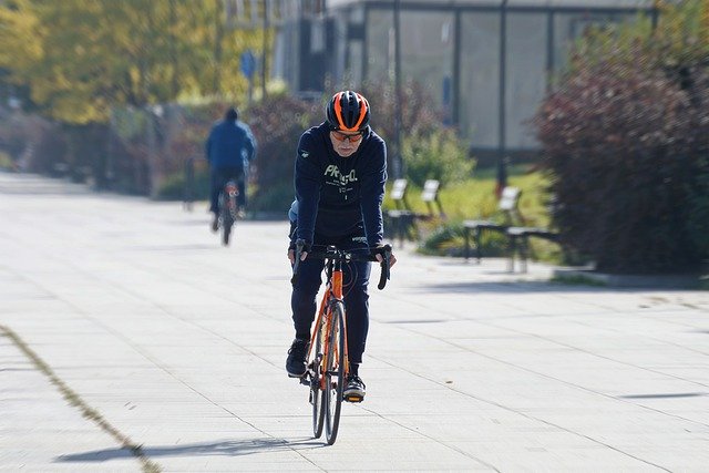 Free download bicyclist man elderly helmet free picture to be edited with GIMP free online image editor