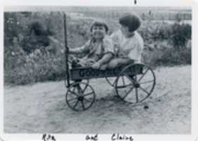 Free download Claire and Rita in wagon about 1922 free photo or picture to be edited with GIMP online image editor