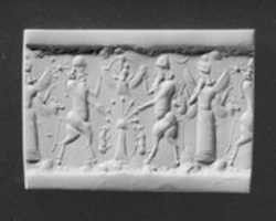 Free download Cylinder seal and modern impression: bull-men flanking deity above sacred tree; winged deity holding horned animal heads free photo or picture to be edited with GIMP online image editor