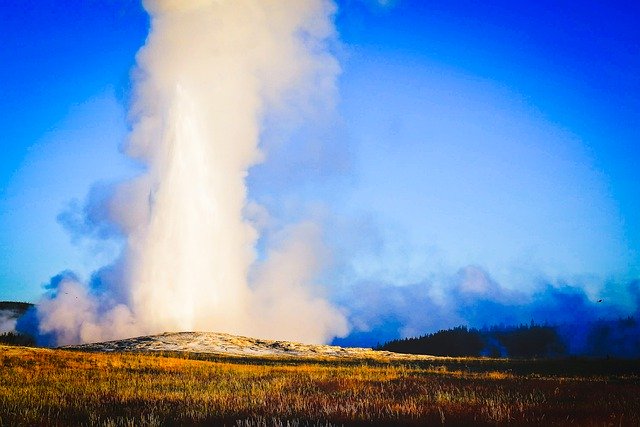 Free download geyser smoke blue sky field free picture to be edited with GIMP free online image editor