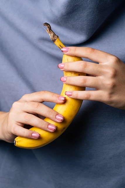 Free download girl banana yellow hands nails free picture to be edited with GIMP free online image editor