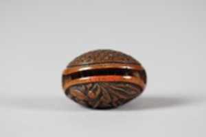 Free download Netsuke in the form of a Nut Containing a Carved Landscape free photo or picture to be edited with GIMP online image editor